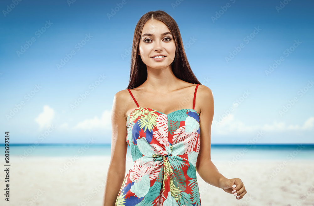 Beautiful young woman on the beach. Blurry beach and ocean background. Beautiful young woman on the beach. Blurry beach and ocean background.