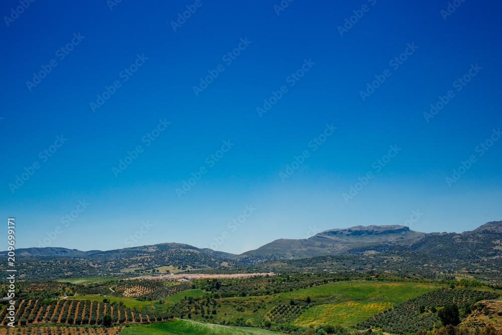 The view of the Serranía de Ronda mountains and countryside seen from Ronda, Andalusia, Spain. The view of the Serranía de Ronda mountains and countryside seen from Ronda, Andalusia, Spain.