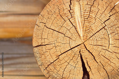 Texture of sawed wood and connection of the log house. Ancient technology construction of Russian log hut, timber cottages and churches