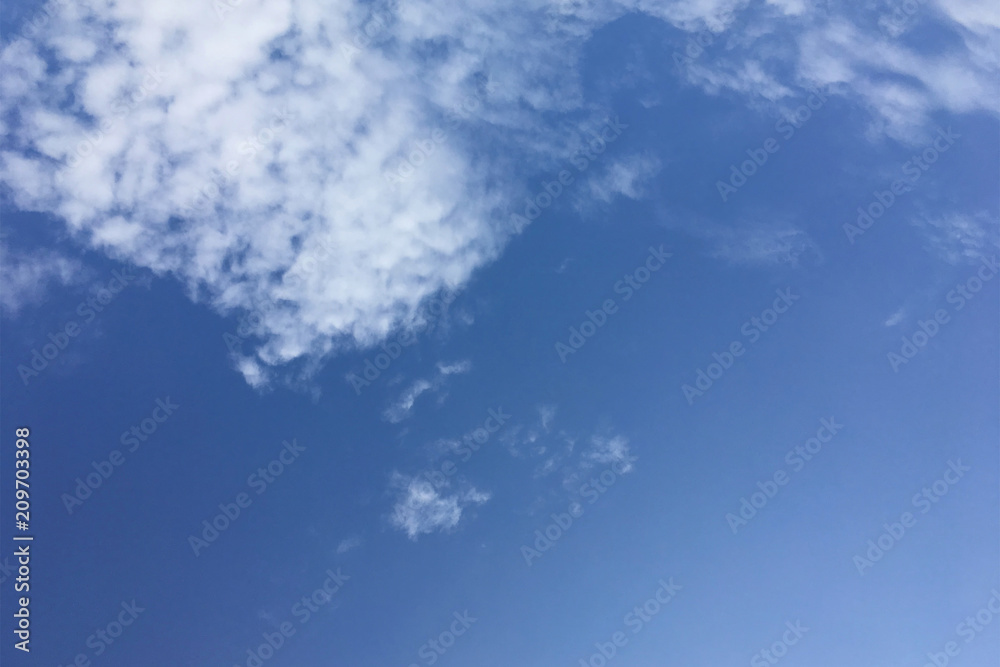 Clear blue sky with plain white cloud Clear blue sky with plain white cloud