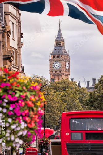 Red bus against Big Ben in London  England