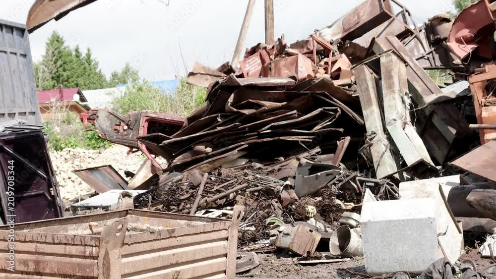Crane with claw, metal recycling junkyard Crane with claw, metal recycling junkyard
