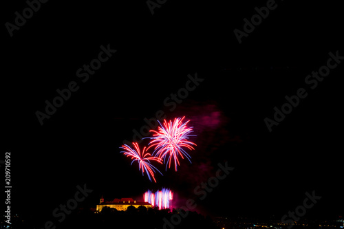 Beautiful colorful firework in city Brno on Spilberk