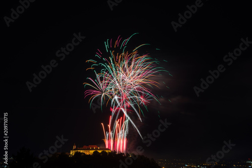 Beautiful colorful firework in city Brno on Spilberk