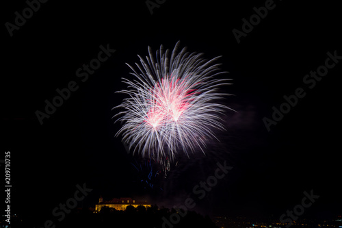 Beautiful colorful firework in city Brno on Spilberk