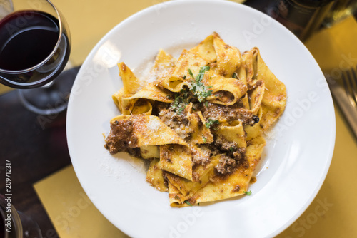 pappardelle with wild boar sauce, Tuscan cuisine photo