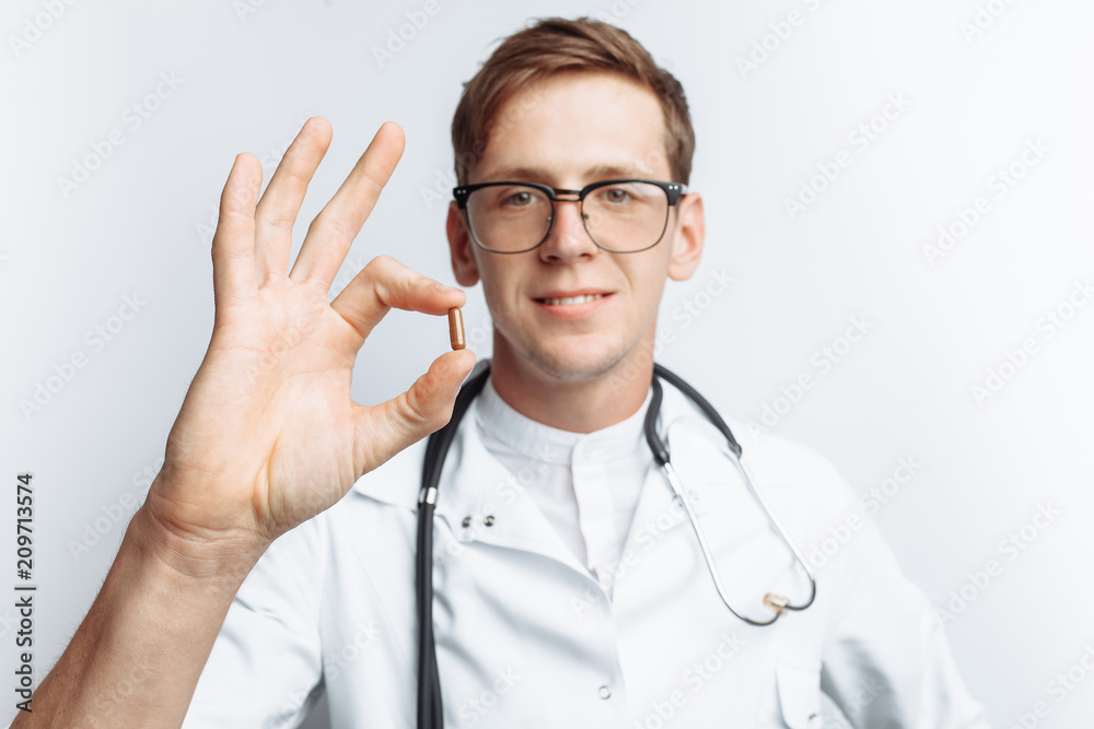 Hand doctor holding tablet, close-up, white background, for advertising, text insertion Hand doctor holding tablet, close-up, white background, for advertising, text insertion
