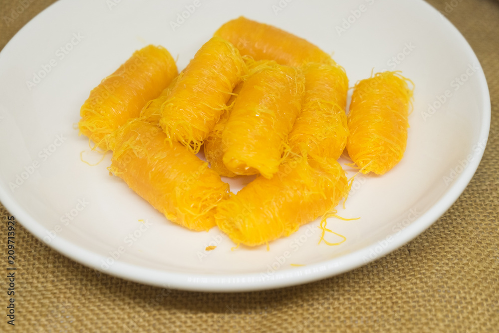 Rolled egg yolk thread, Thai traditional dessert Rolled egg yolk thread, Thai traditional dessert