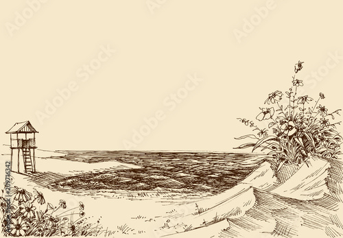 Sea view from the beach. Lifeguard tower in the background