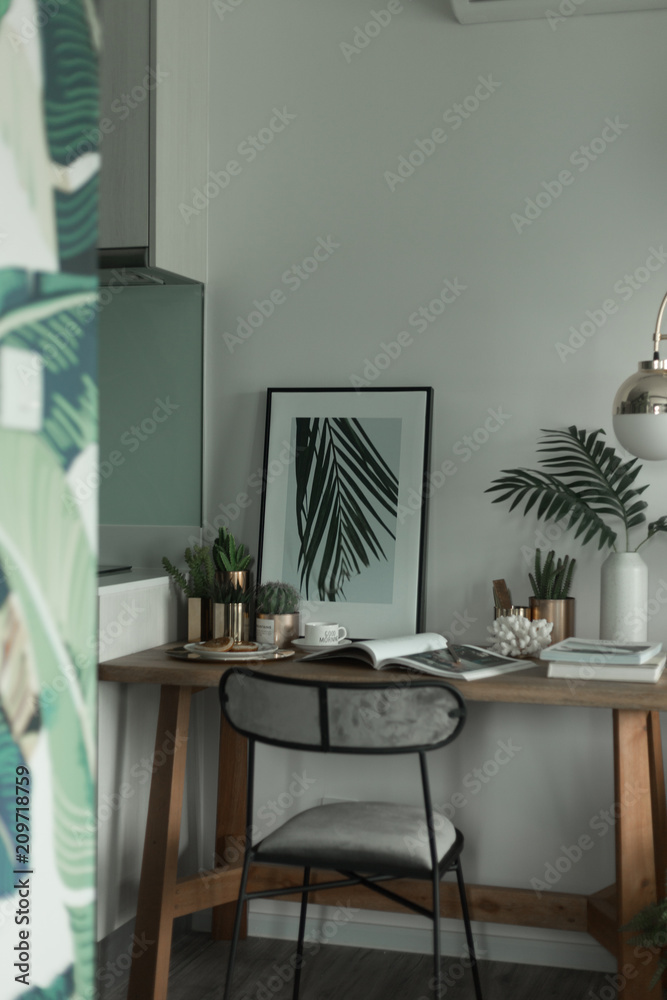 Cozy working corner with decorative items in natural theme /Cozy Interior concept Cozy working corner with decorative items in natural theme /Cozy Interior concept