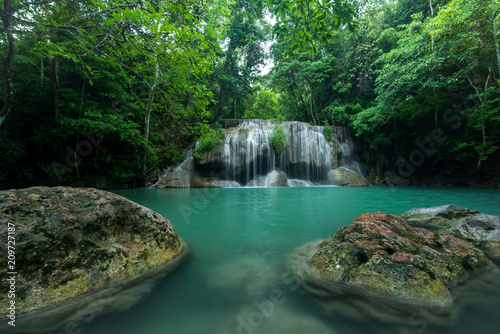 Breathtaking green waterfall at deep forest, Erawan waterfall located Kanchanaburi Province, Thailand