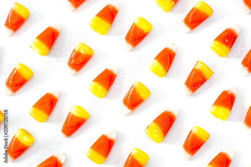 Typical halloween candy corn pattern isolated on white background
