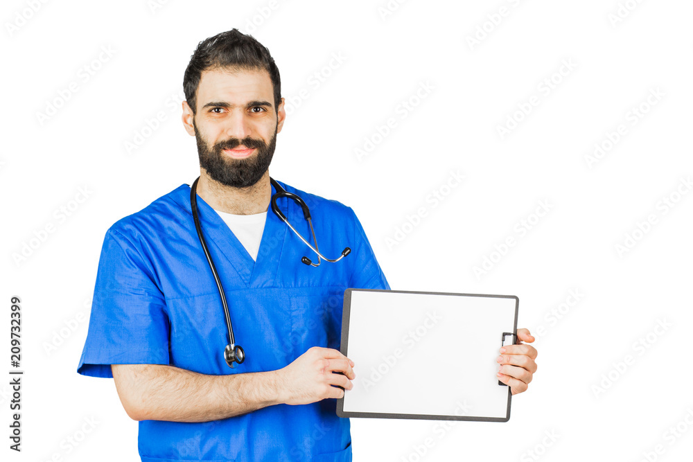 Doctor in blue robe with stethoscope pointing to clipboard isolated on white background Doctor in blue robe with stethoscope pointing to clipboard isolated on white background