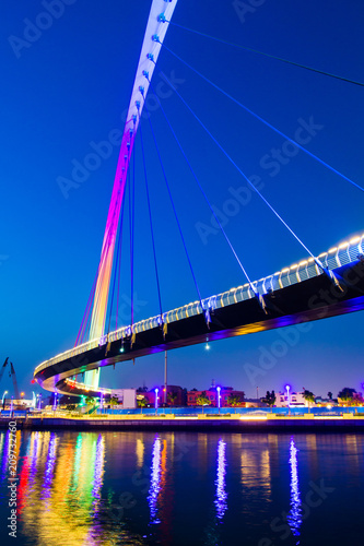 Dubai water canal bridge at night photo