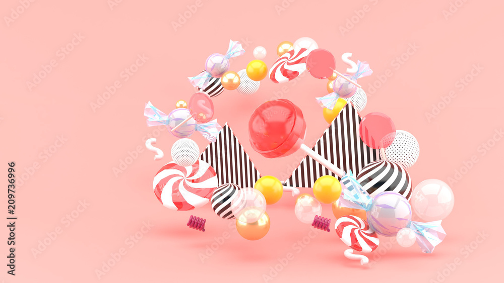 Candy among colorful balls on pink background.-3d rendering..