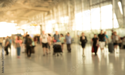blurred image of many passenger movement in the terminal airport for background