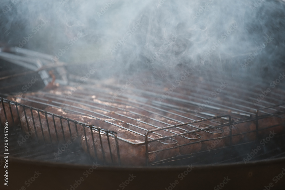 sausages on the grill. barbecue.