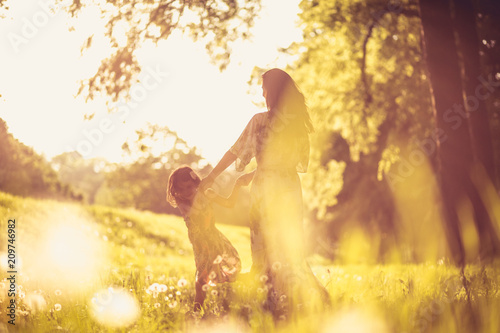 Enjoy in nature. Mother and daughter.