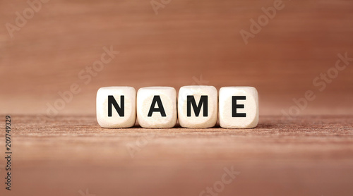 Word NAME made with wood building blocks
