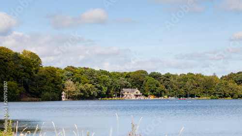 Talkin Tarn.  The view across Talkin Tarn, Cumbria in northern England.  The tarn is a glacial lake and country park close to the town of Brampton. photo