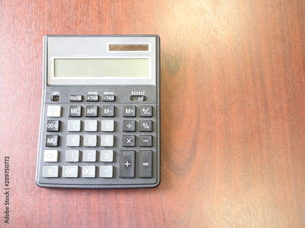 office calculator on the table office calculator on the table