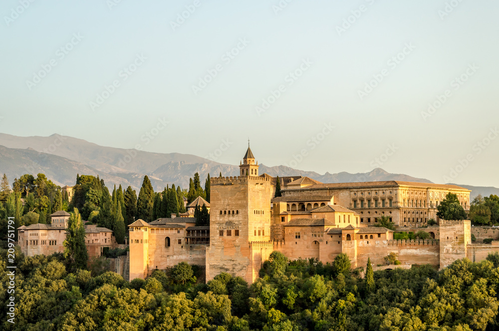 Telephoto view of the moorish Alhambra palace with its famous architecture from the hills of Granada, Andalusia, Spain