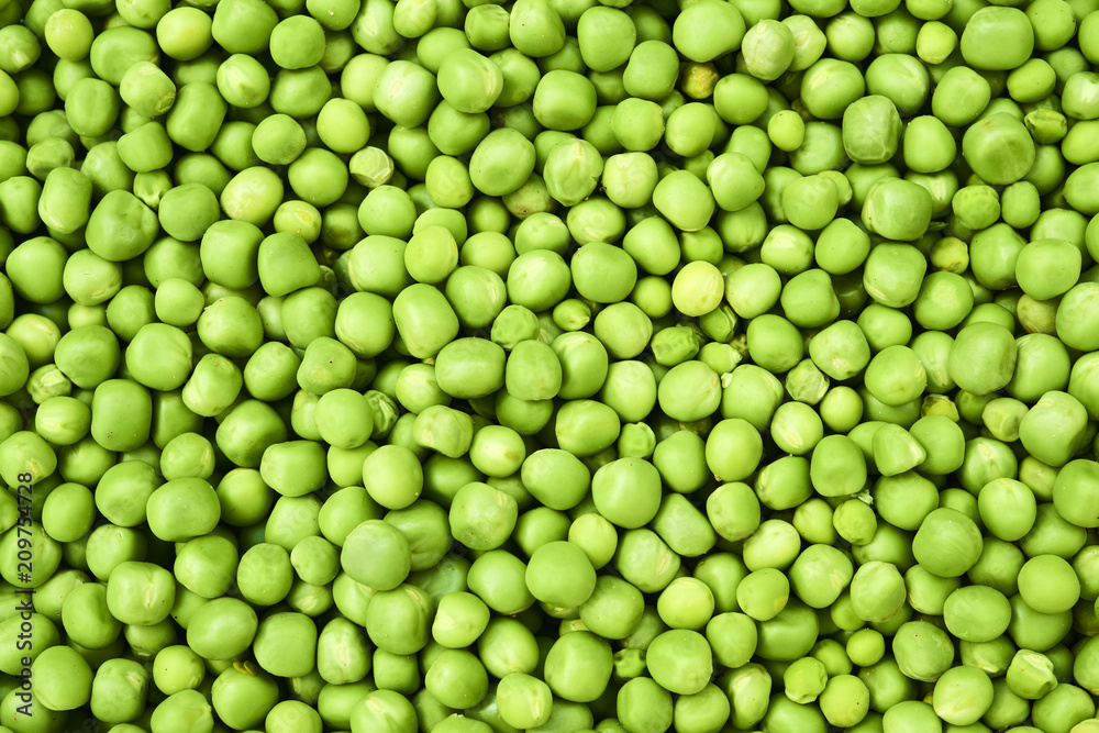 Fresh green peas background texture top view
Fresh green peas background texture top view