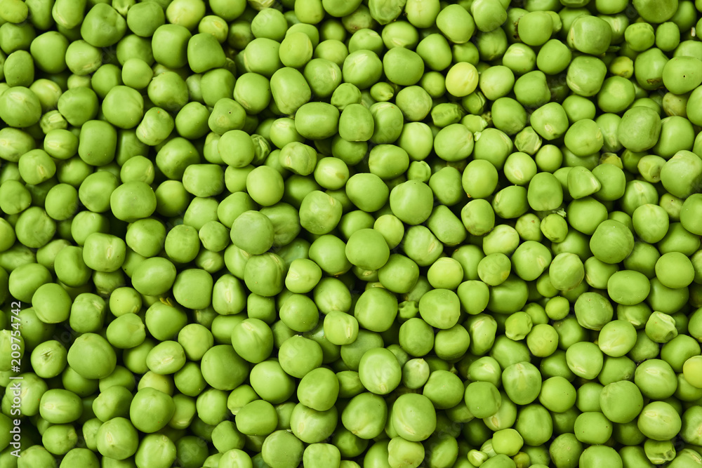 Fresh green peas background texture top view
Fresh green peas background texture top view