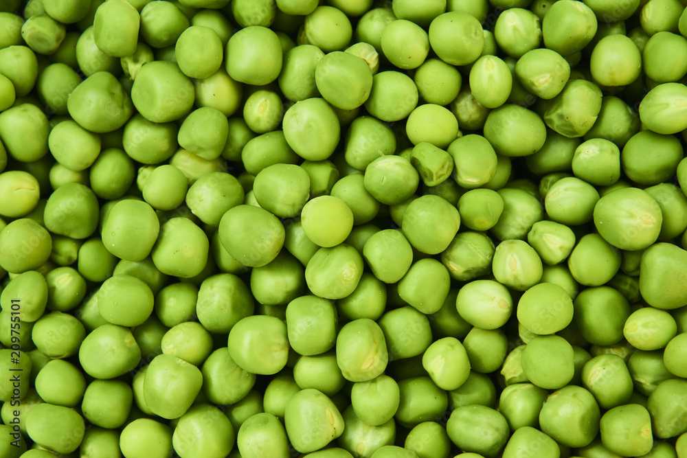 Fresh green peas background texture top view
Fresh green peas background texture top view
