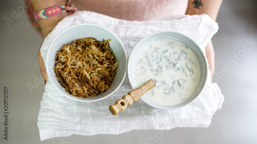 Turkish caciki in the bowl with spoon photo