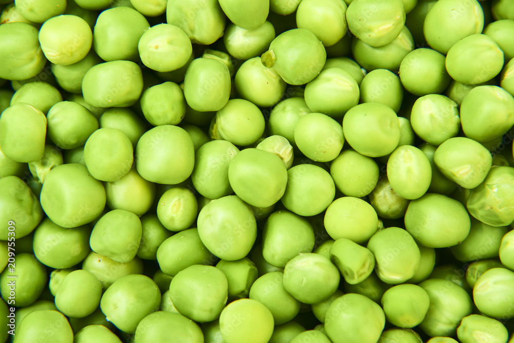 Fresh green peas background texture top view
Fresh green peas background texture top view