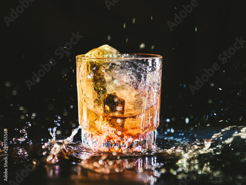 glass of whiskey with ice 