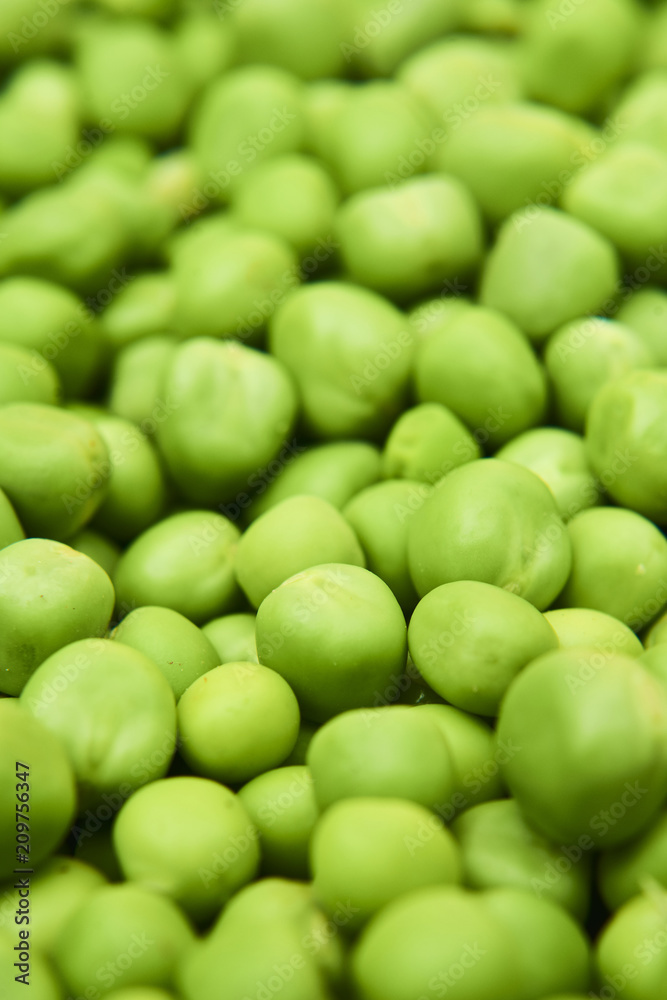Fresh green peas background texture top view
Fresh green peas background texture top view