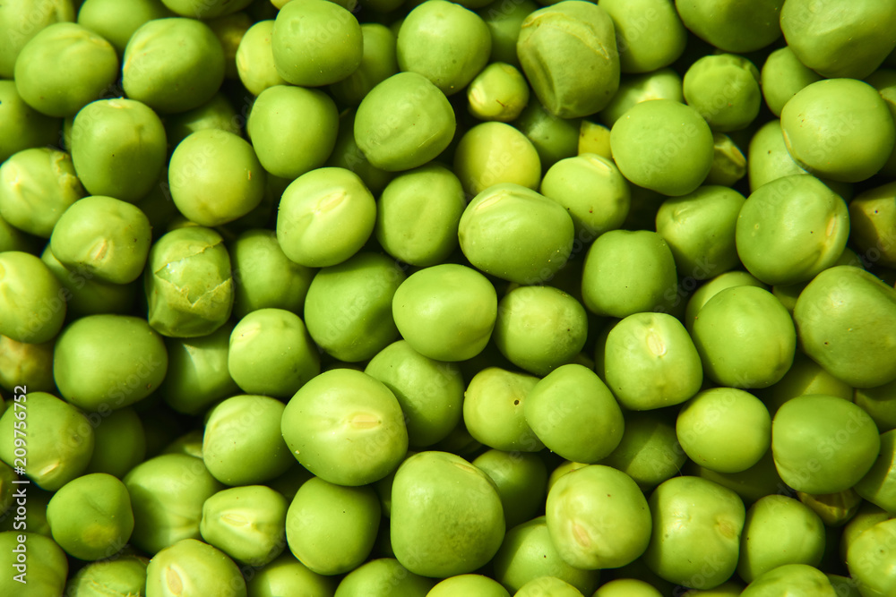 Fresh green peas background texture top view
Fresh green peas background texture top view
