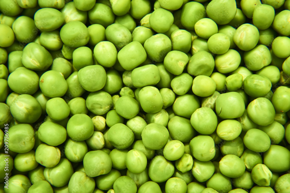 Fresh green peas background texture top view
Fresh green peas background texture top view