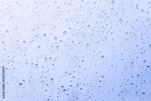 Drops of the rain on the home window