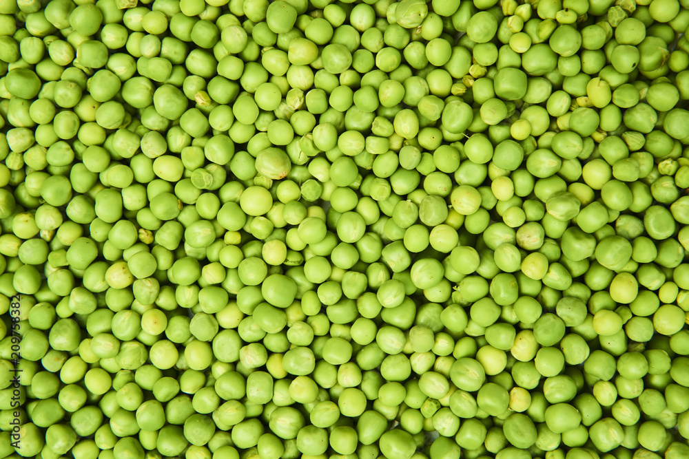 Fresh green peas background texture top view
Fresh green peas background texture top view