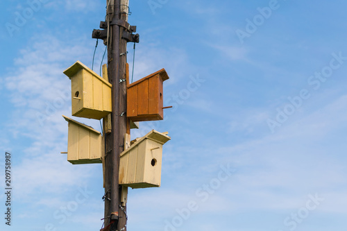 Many birdhouses on the sky.