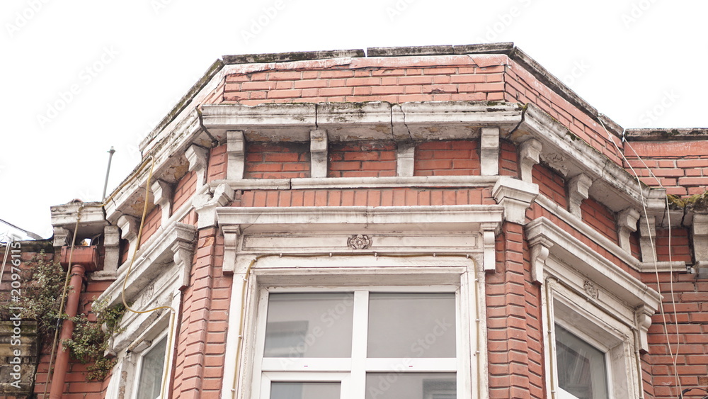 Fototapeta premium old built brick houses