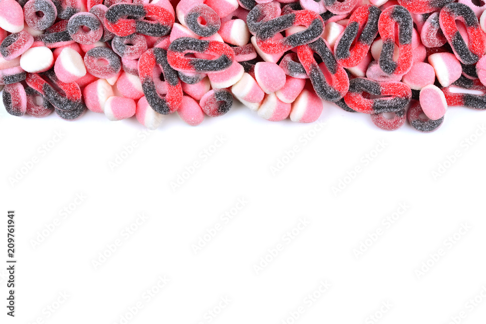 Assorted pink juicy gummy candies. Top view. Assorted pink juicy gummy candies. Top view.