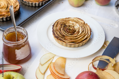 Ingredients for home made apple tart on white table cloth