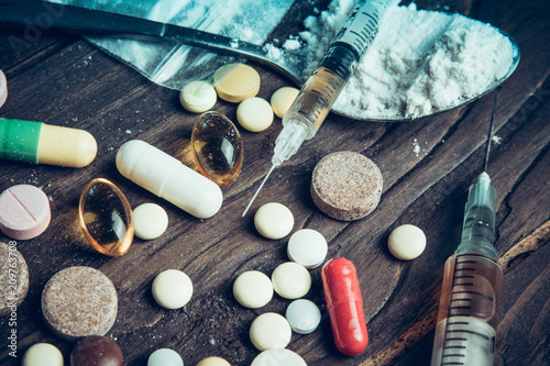 Drug concept. Use illicit Drug abuse .Addiction heroin.Injection, doping. Opium epidemic. Toning, selective focus.
