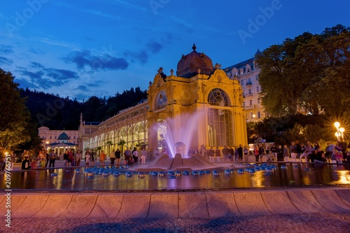 Main colonnade and singing fountain at night - center of Marianske Lazne (Marienbad) - great famous Bohemian spa town in the west part of the Czech Republic (region Karlovy Vary)