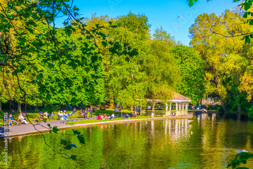 View of a small pond in the Saint Stephen's Green park in Dublin, Ireland photo