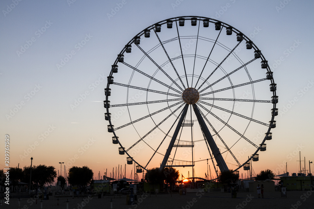 Ferris wheel on sunset