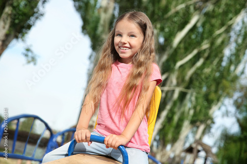 Cute little girl on childre...