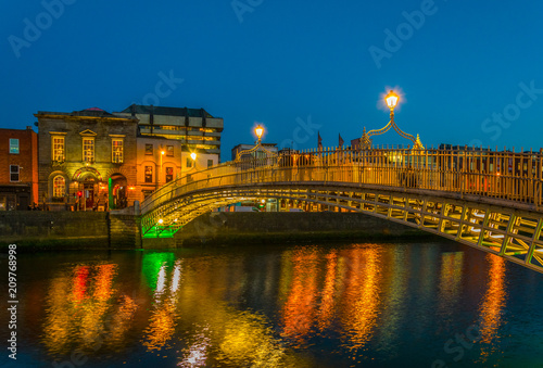 Photography Sunset view of the Millenium bridge in Dublin, Ireland
