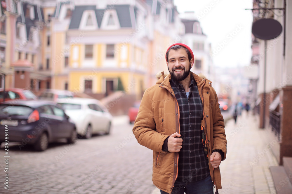 Handsome trendy hipster walking outdoors Handsome trendy hipster walking outdoors