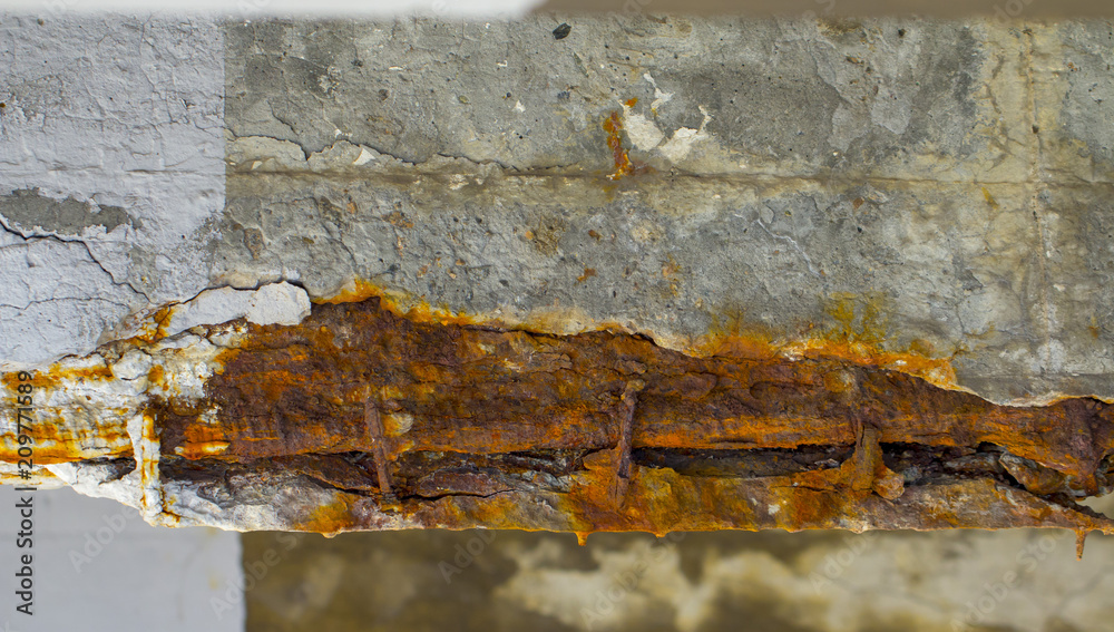 Fototapeta premium Damaged bridge support close - up transportatin concrete