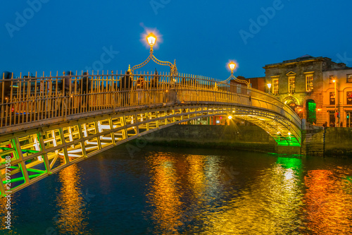 Sunset view of the Millenium bridge in Dublin, Ireland photo